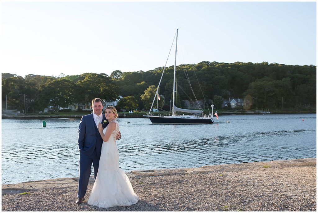 Bride and groom on the shores of Mystic Seaport Museum, in Mystic CT. 
